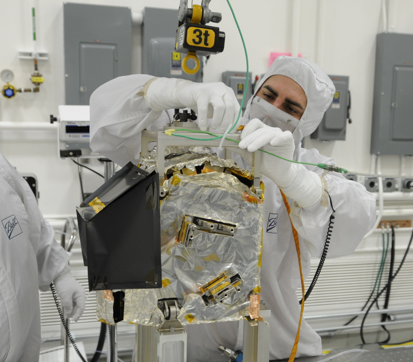 A Ball Aerospace employee works on the JPSS-1/NOAA-20 satellite with a 3-ton wireless Ron 2501 dynamometer A Ball Aerospace employee works on the JPSS-1/NOAA-20 satellite with a 3-ton wireless Ron 2501 dynamometer